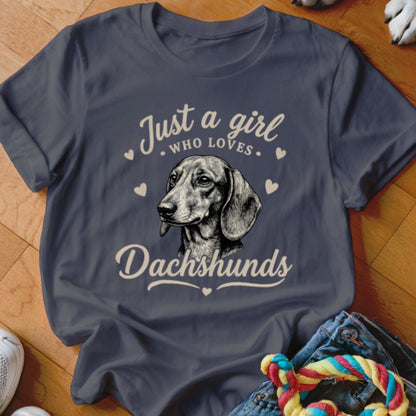 Dark gray crewneck t-shirt featuring a dachshund graphic and text reading Just a girl who loves Dachshunds.