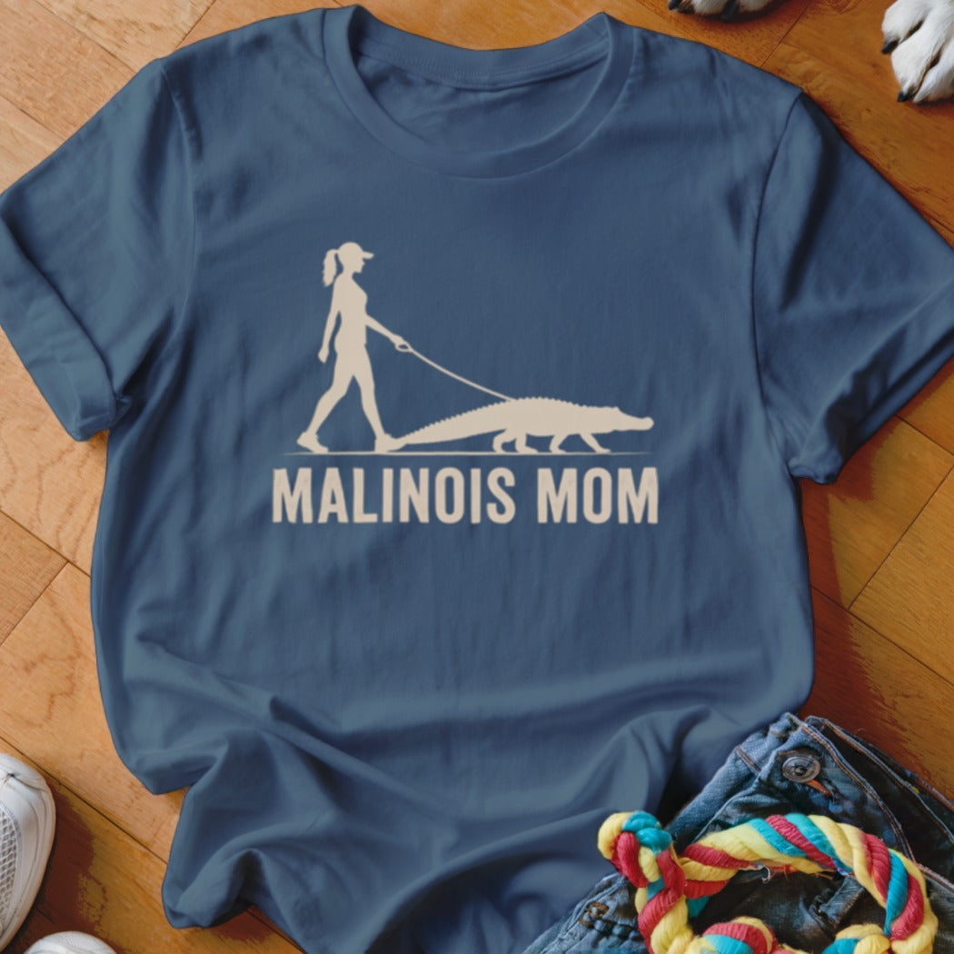 Blue t-shirt with a woman walking an alligator graphic and "Malinois Mom" text.