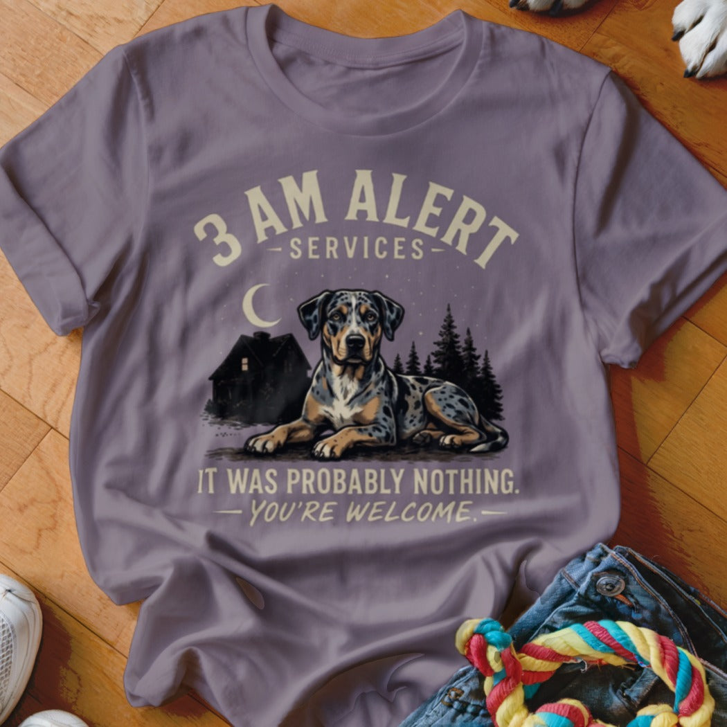 Shirt with 3 AM alert services design featuring a dog, house, and trees at night.
