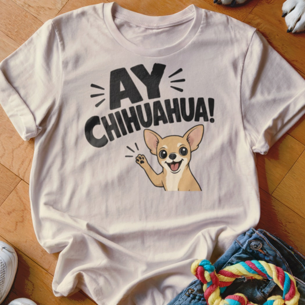 Light t-shirt with a cartoon chihuahua and "Ay Chihuahua!" text.