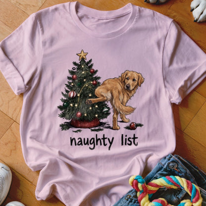 Pink t-shirt with a Golden Retriever lifting its leg next to a Christmas tree with "naughty list" text.