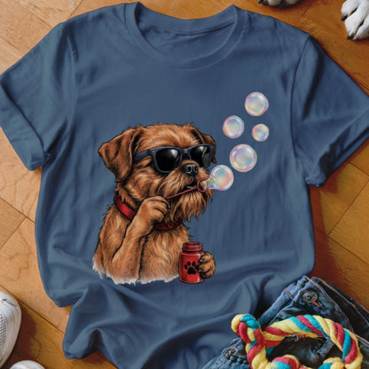 A dark blue t-shirt printed with a graphic of a brown dog wearing sunglasses and blowing bubbles.