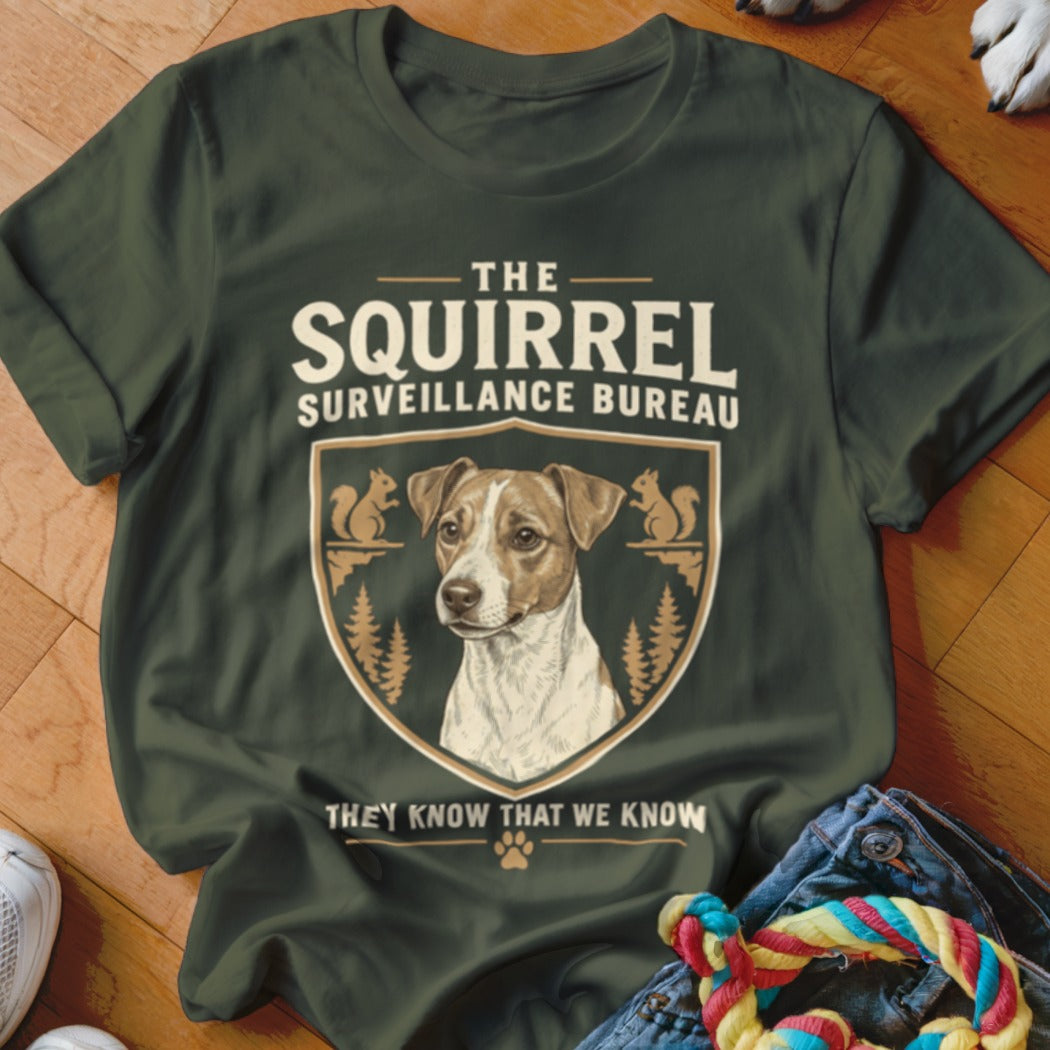 Dark green t-shirt featuring a Jack Russell terrier crest and the text The Squirrel Surveillance Bureau.