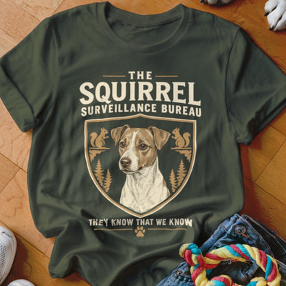 Dark green t-shirt featuring a Jack Russell terrier crest and the text The Squirrel Surveillance Bureau.