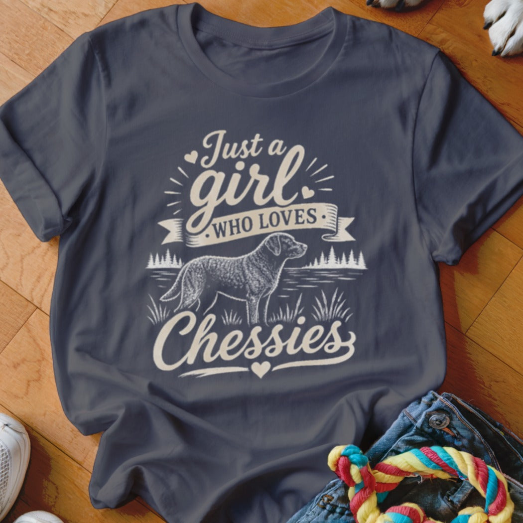 Dark blue t-shirt with "Just a girl who loves Chessies" and dog graphic.