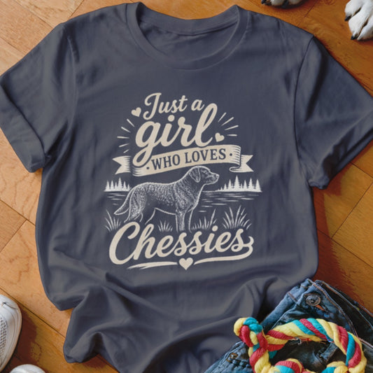 Dark blue t-shirt with "Just a girl who loves Chessies" and dog graphic.