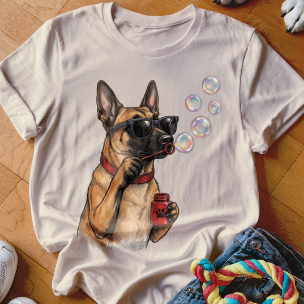 Light cream t-shirt featuring a graphic of a German Shepherd wearing sunglasses and blowing bubbles.
