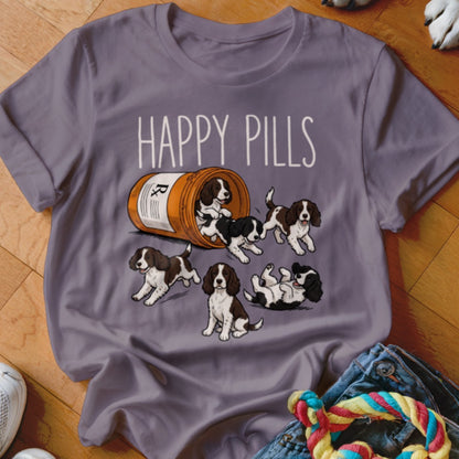 T-shirt with a prescription bottle spilling out puppies and "Happy Pills" text.