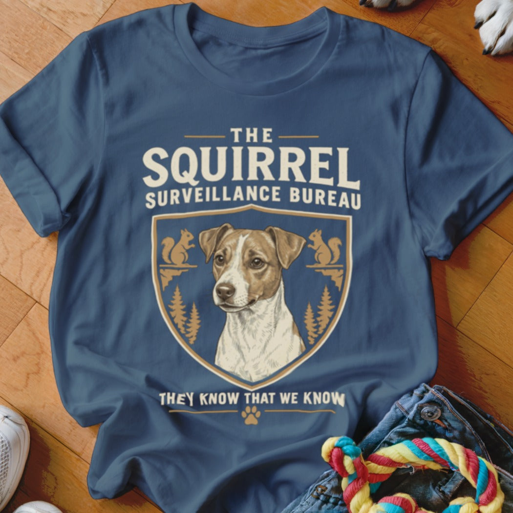 Navy blue t-shirt featuring a Jack Russell Terrier graphic and text reading The Squirrel Surveillance Bureau.
