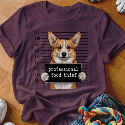 Corgi in mugshot holding "professional food thief" sign with height chart.
