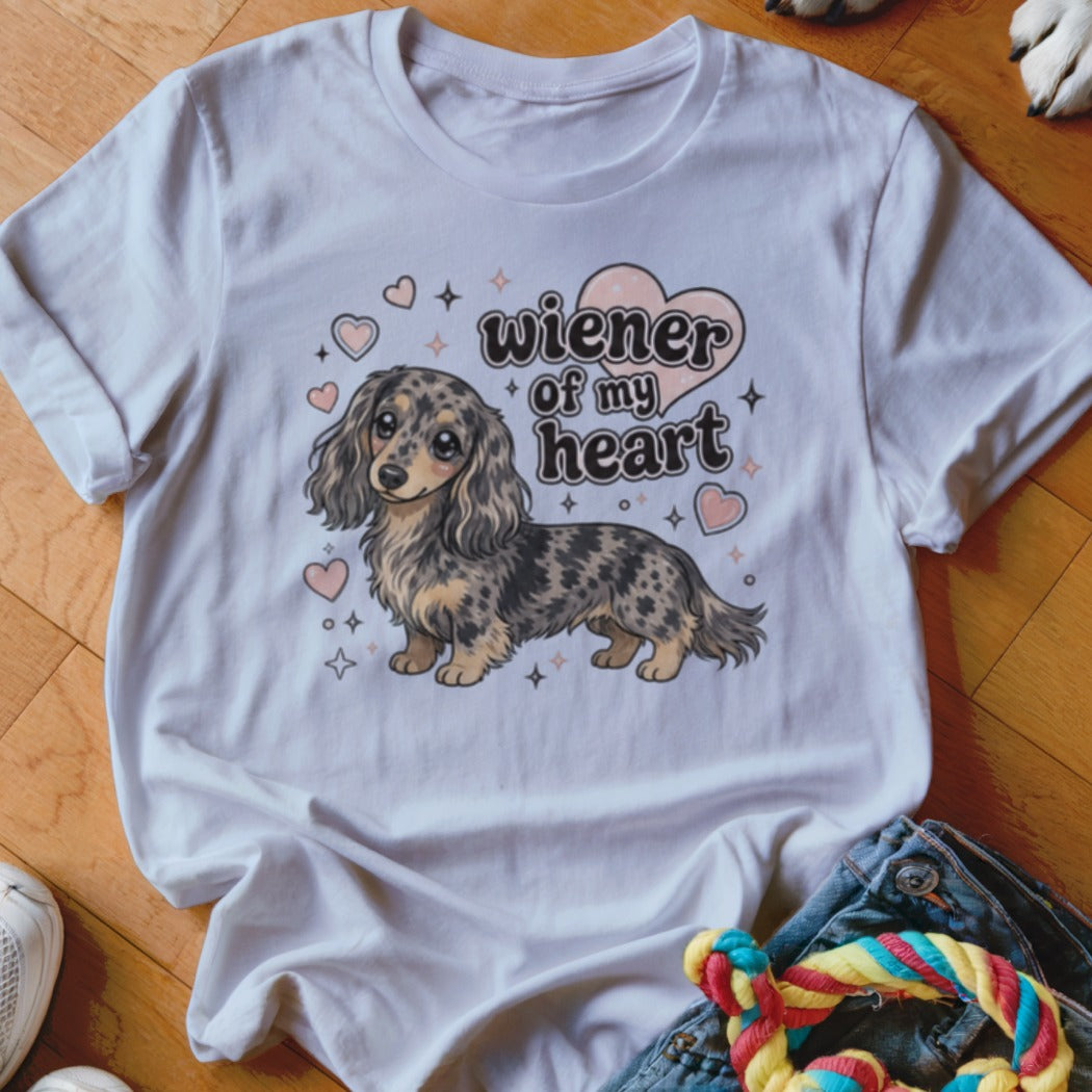 White t-shirt with cartoon dachshund and text "wiener of my heart".