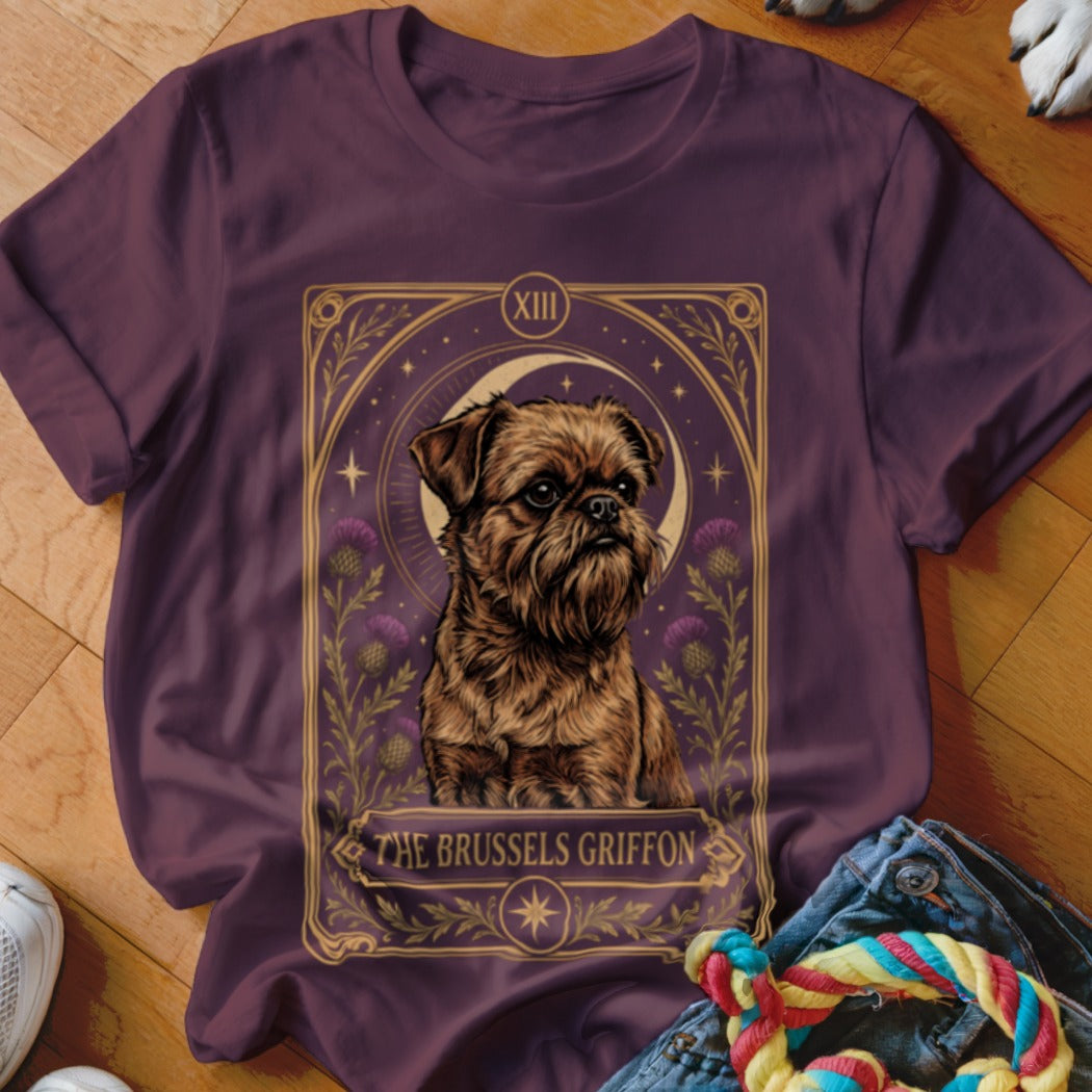 Maroon t-shirt featuring a tarot card graphic of a Brussels Griffon and the text The Brussels Griffon.