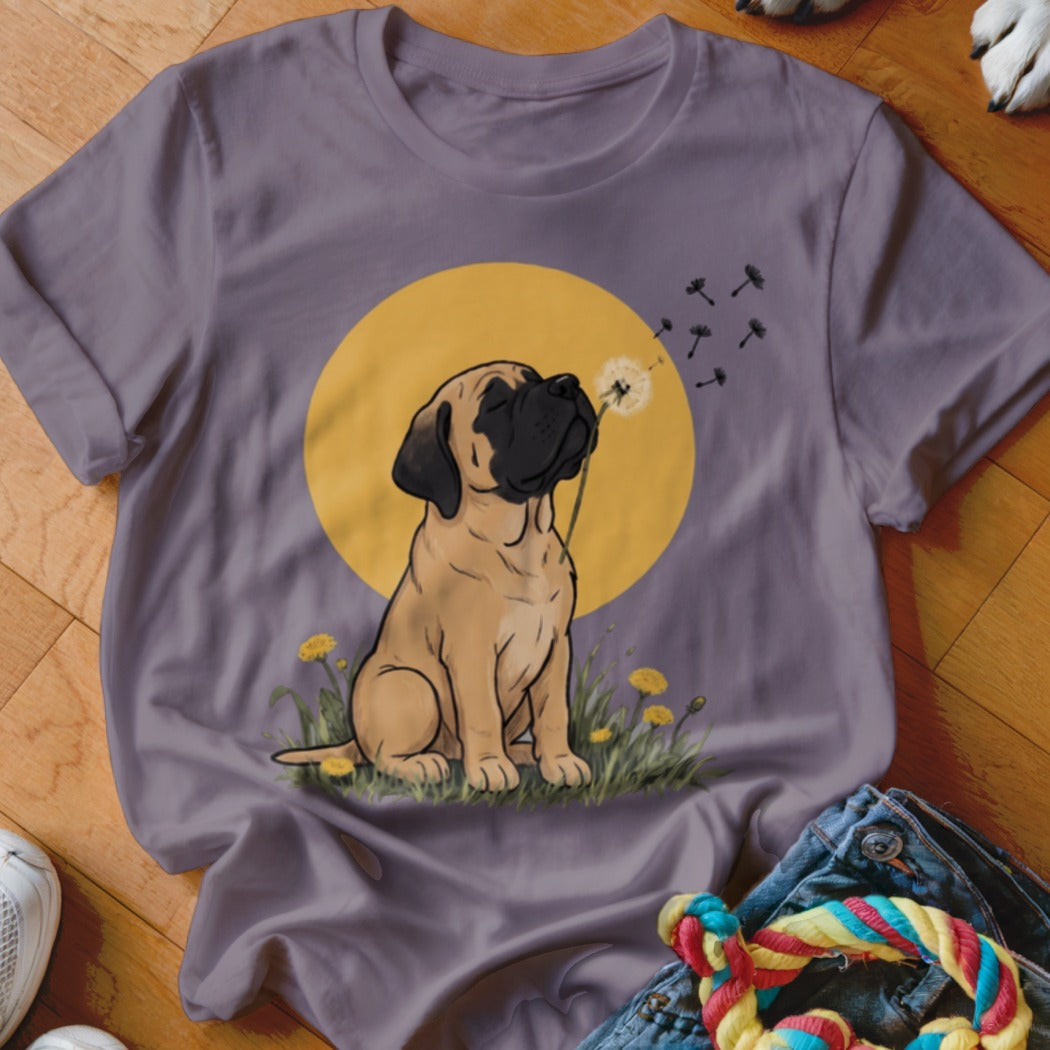 Gray t-shirt featuring a cartoon mastiff puppy blowing dandelion seeds against a yellow moon.