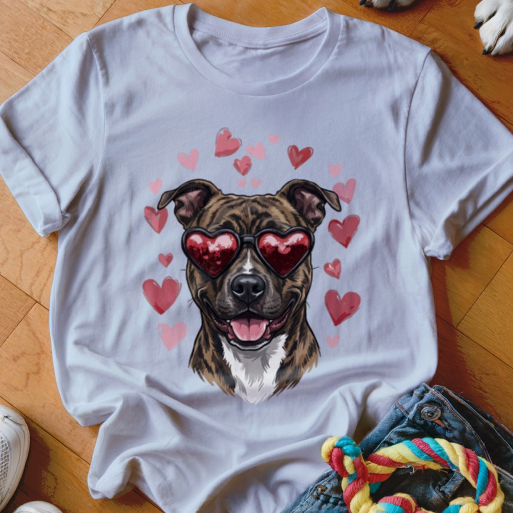 White crewneck t-shirt featuring a graphic of a brindle dog wearing heart-shaped sunglasses surrounded by pink hearts.