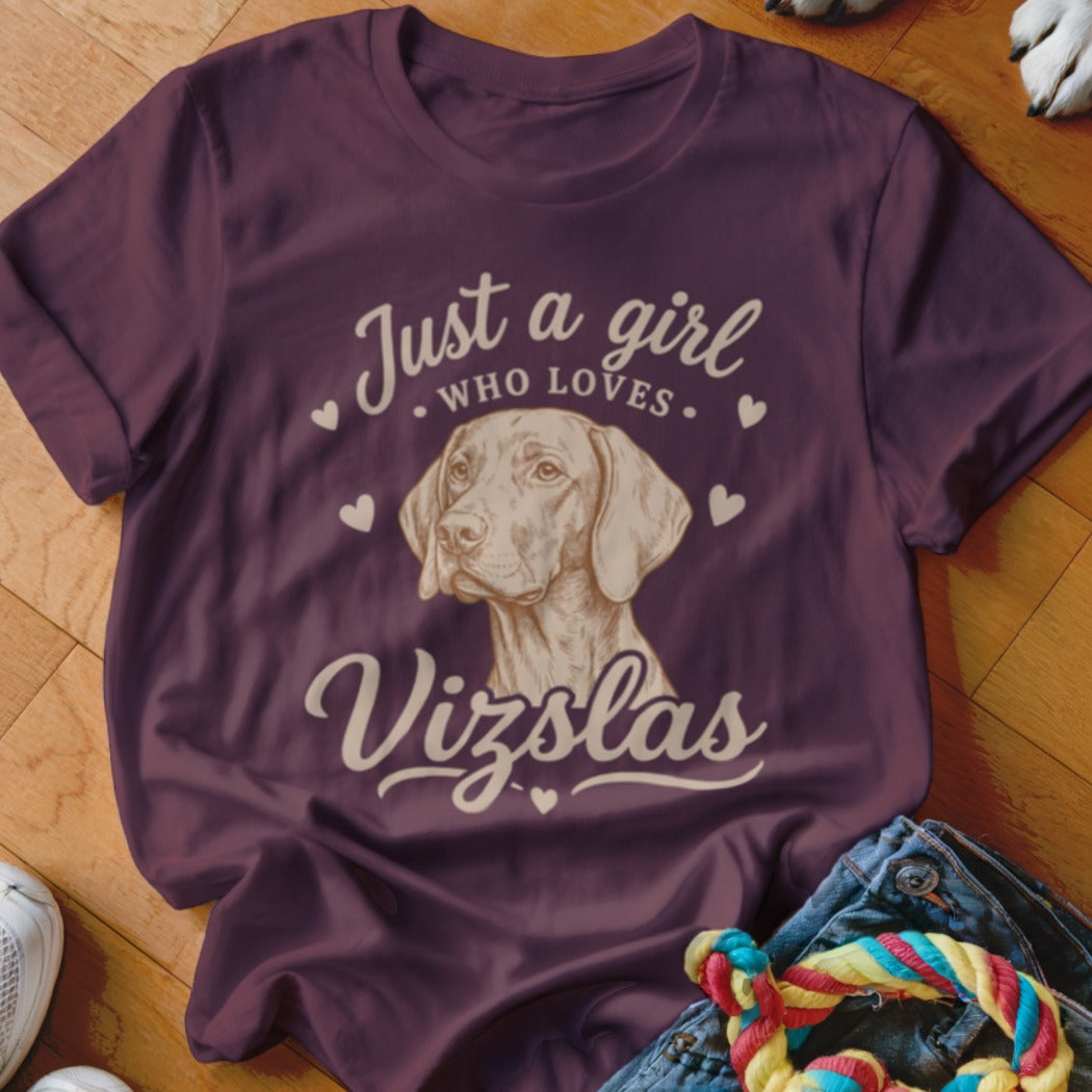 Plum t-shirt featuring a graphic of a Vizsla dog with the text Just a girl who loves Vizslas.