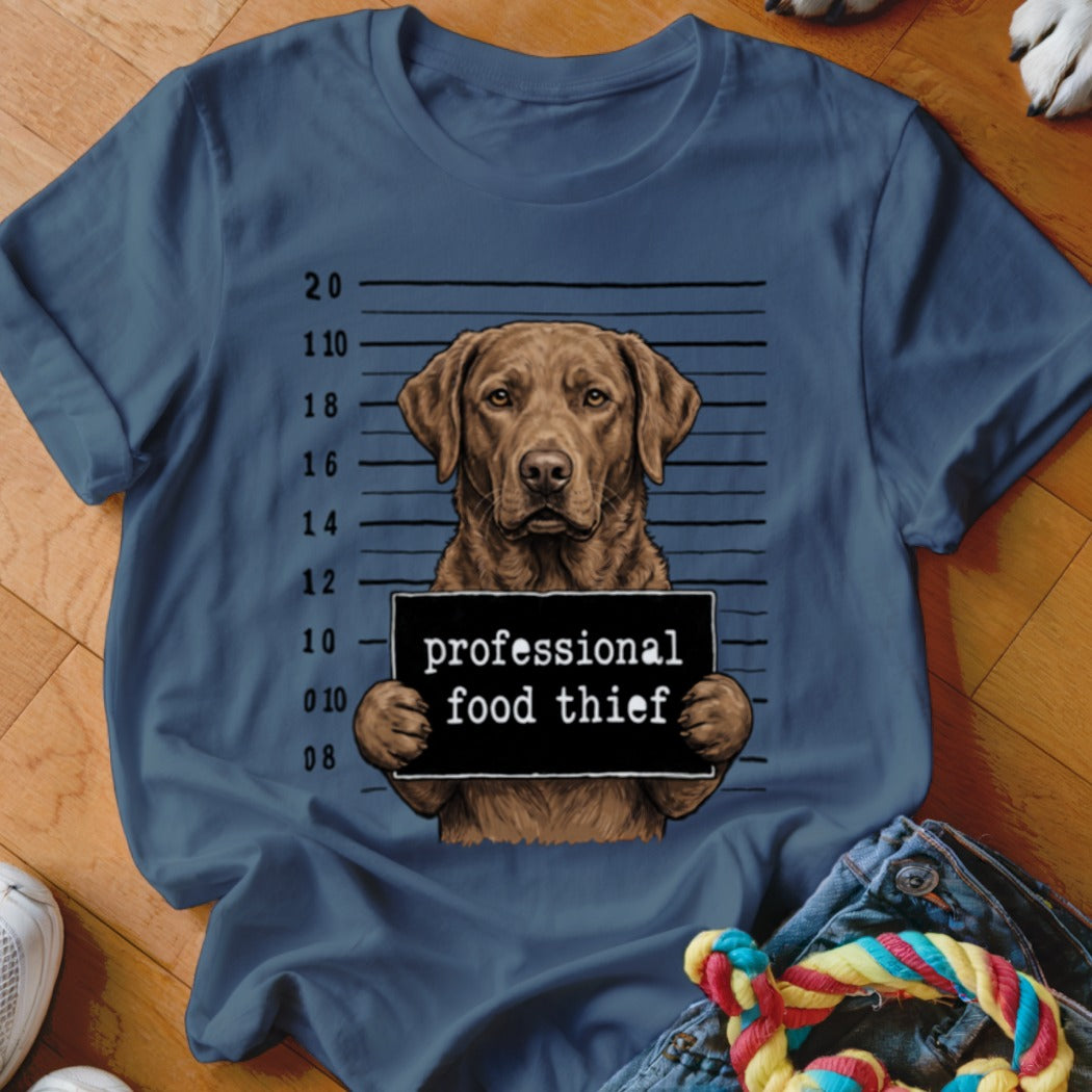 Brown dog mugshot with "professional food thief" sign and height markers.