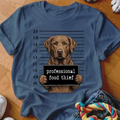 Brown dog mugshot with "professional food thief" sign and height markers.