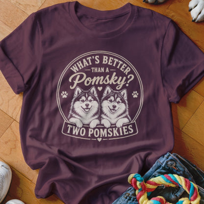 Burgundy t-shirt with "What's better than a Pomsky? Two Pomsies" and two dog illustrations.