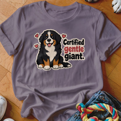 Bernese Mountain Dog with hearts and "Certified gentle giant." text on a purple t-shirt.