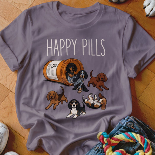 Grey t-shirt with "HAPPY PILLS" text and puppies spilling from a pill bottle.