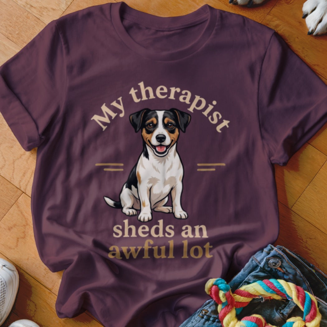 T-shirt graphic of a smiling dog with text "My therapist sheds an awful lot".
