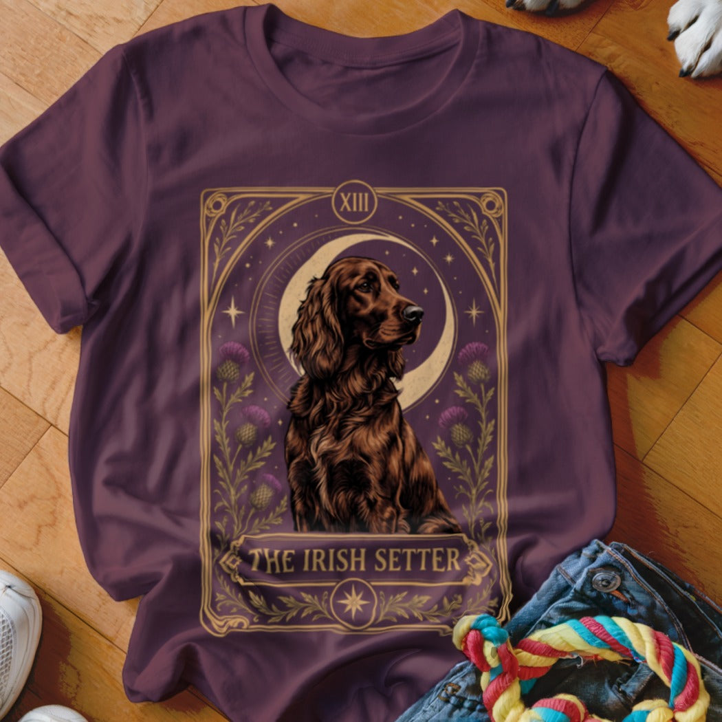 Plum-colored t-shirt featuring a tarot card graphic of an Irish Setter dog with a crescent moon.