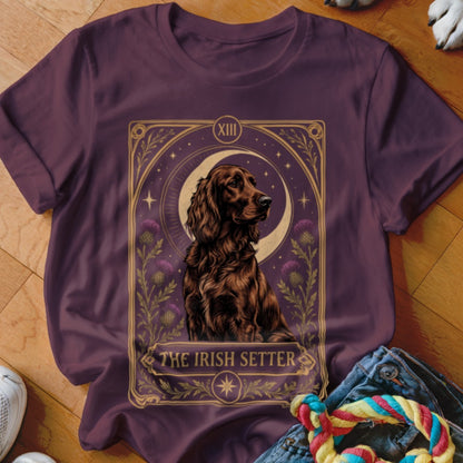 Plum-colored t-shirt featuring a tarot card graphic of an Irish Setter dog with a crescent moon.