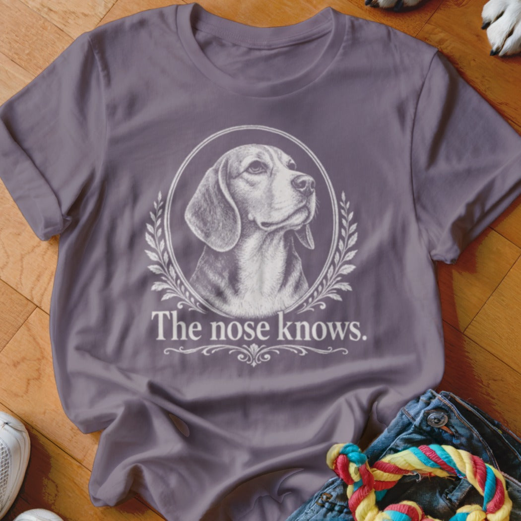 Beagle portrait with laurel wreath and text "The nose knows" on a t-shirt.