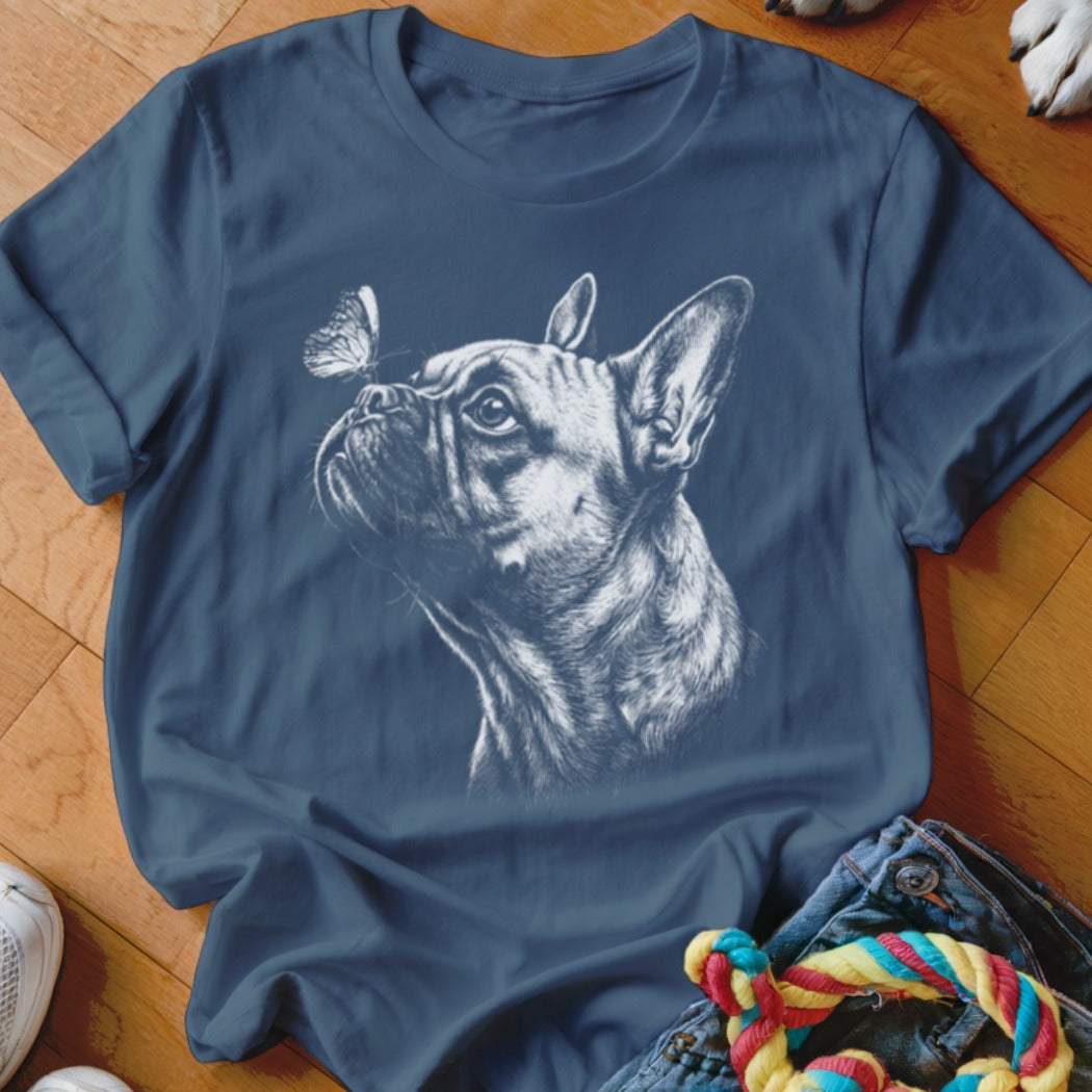 Navy blue crewneck t-shirt featuring a white sketch of a French bulldog looking at a butterfly.