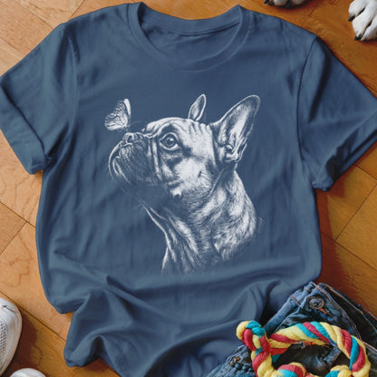 Navy blue crewneck t-shirt featuring a white sketch of a French bulldog looking at a butterfly.