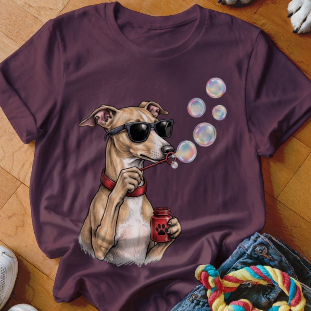 Maroon t-shirt featuring a graphic of a dog wearing sunglasses and blowing bubbles.