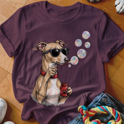 Maroon t-shirt featuring a graphic of a dog wearing sunglasses and blowing bubbles.