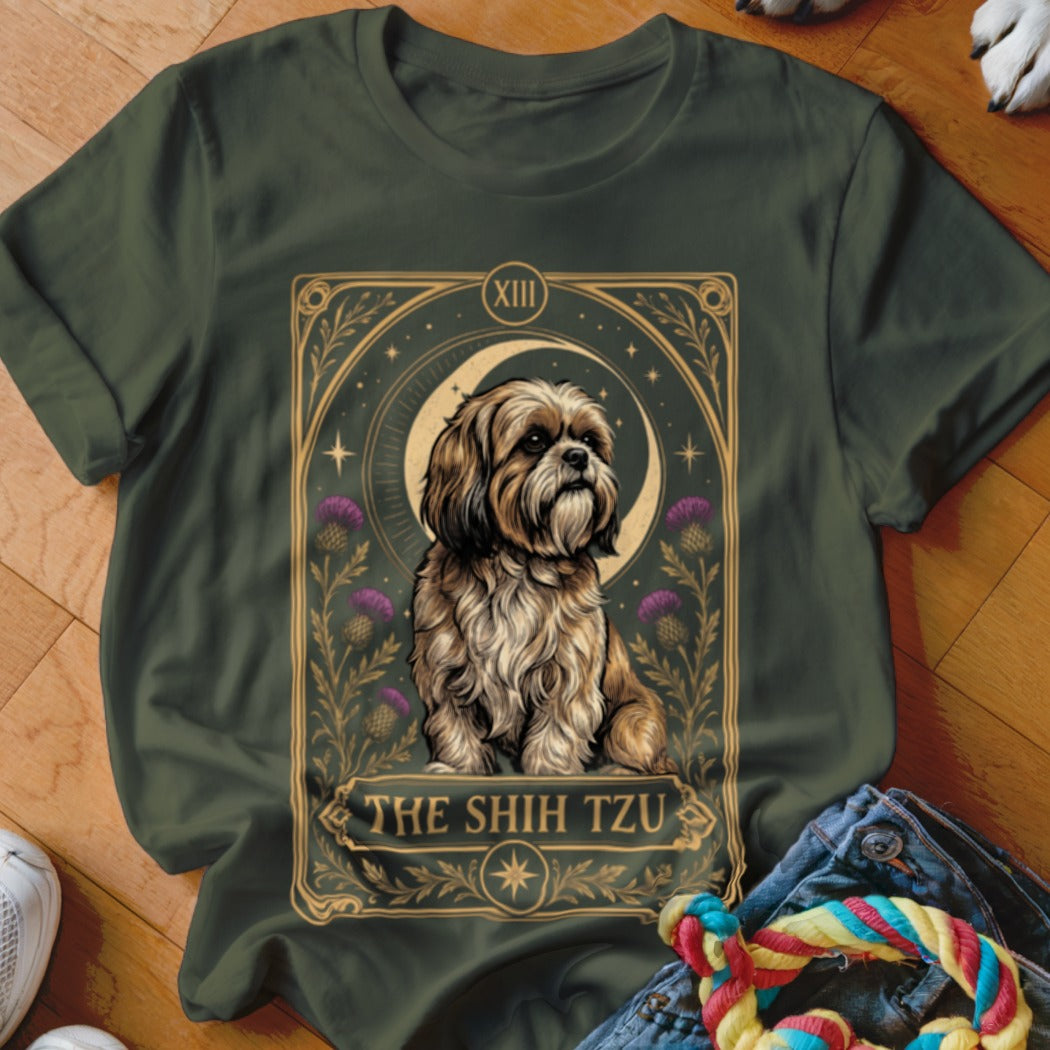 Dark green t-shirt featuring a tarot card graphic of a Shih Tzu surrounded by thistles and a crescent moon.
