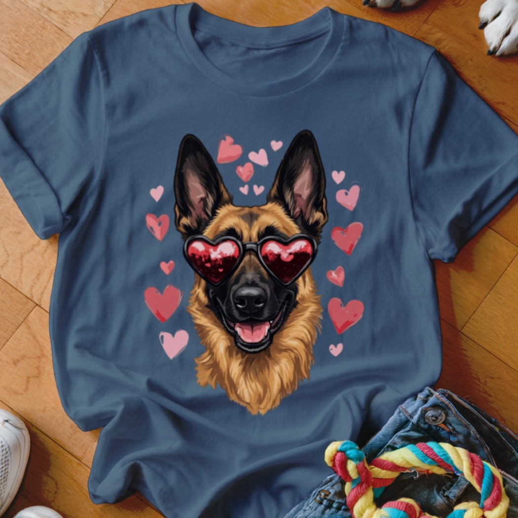 A dark blue t-shirt printed with a graphic of a German Shepherd wearing heart-shaped sunglasses surrounded by pink hearts.
