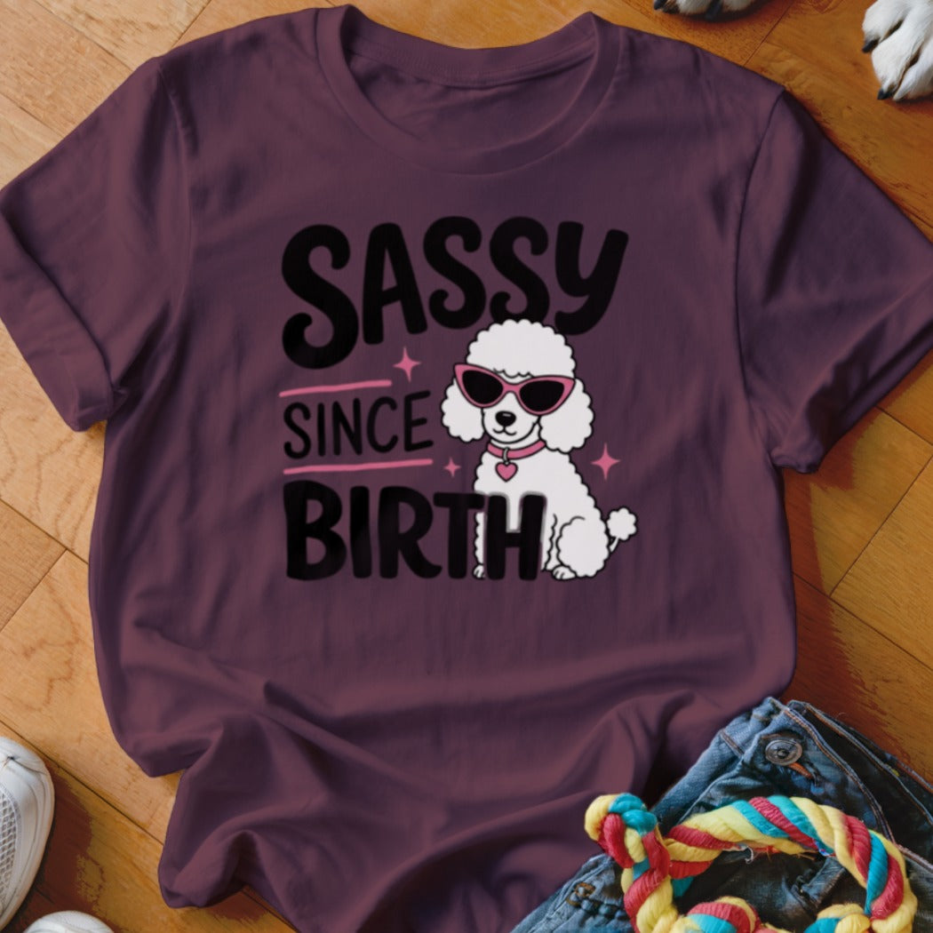 Maroon t-shirt with "Sassy Since Birth" text and a white poodle wearing sunglasses.