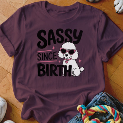 Maroon t-shirt with "Sassy Since Birth" text and a white poodle wearing sunglasses.
