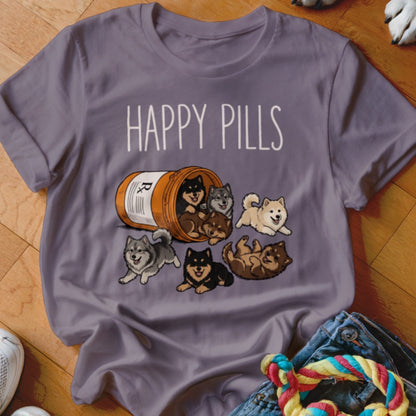 T-shirt with cartoon puppies spilling from a bottle labeled "Happy Pills".