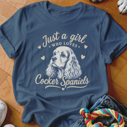 Blue t-shirt with "Just a girl who loves Cocker Spaniels" and a Cocker Spaniel dog illustration.