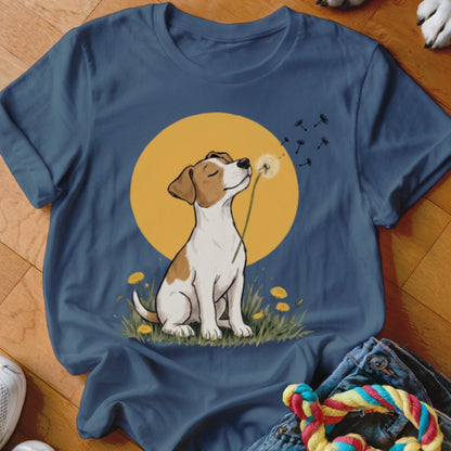 Blue t-shirt featuring an illustration of a dog blowing dandelion seeds against a yellow circle background.