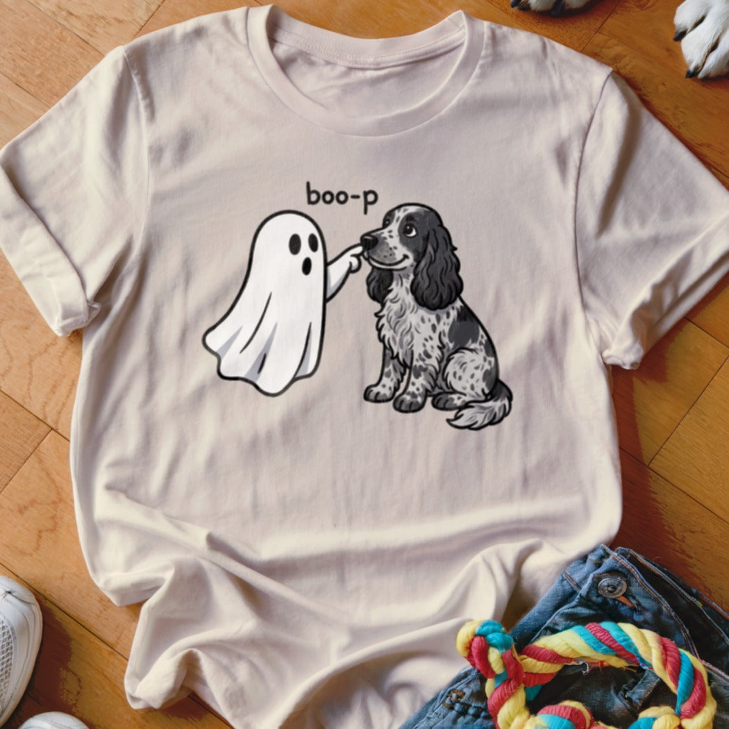 A ghost playfully boops a black and white dog, with "boo-p" text.
