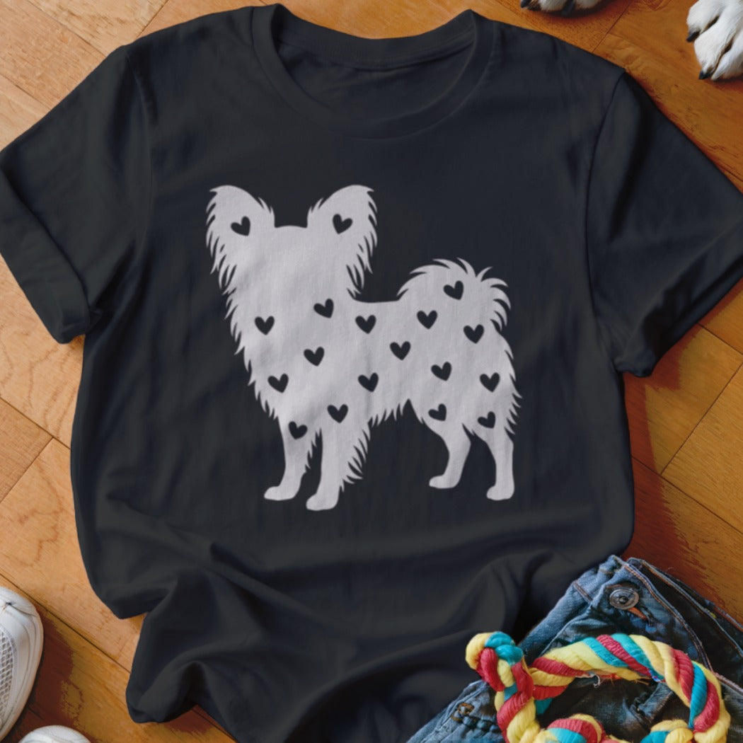 Black t-shirt with white silhouette of dog covered in black hearts.