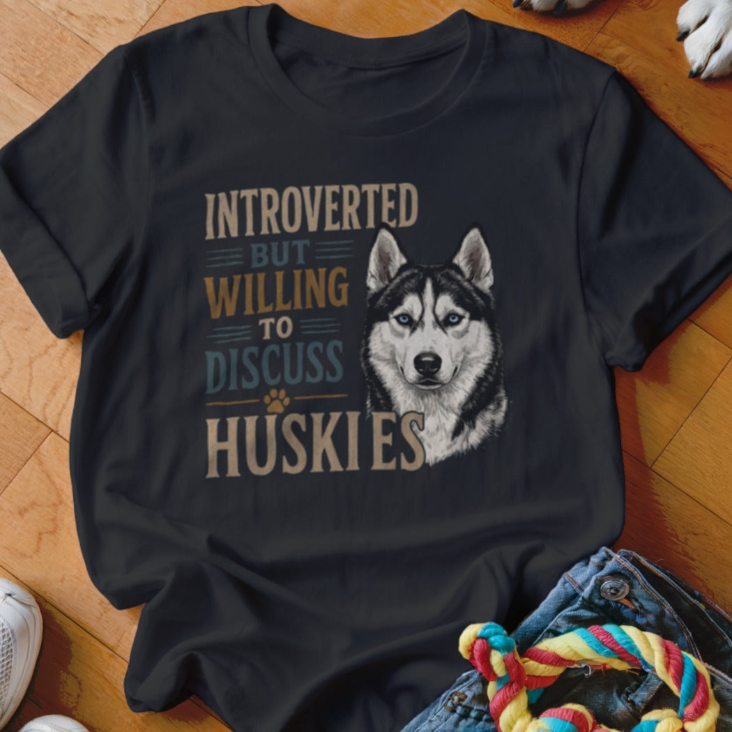 Black t-shirt with "Introverted but willing to discuss Huskies" text and husky graphic.