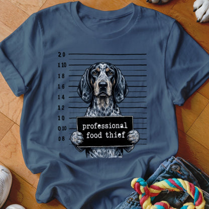 Blue t-shirt with a dog's mugshot, reading "professional food thief".