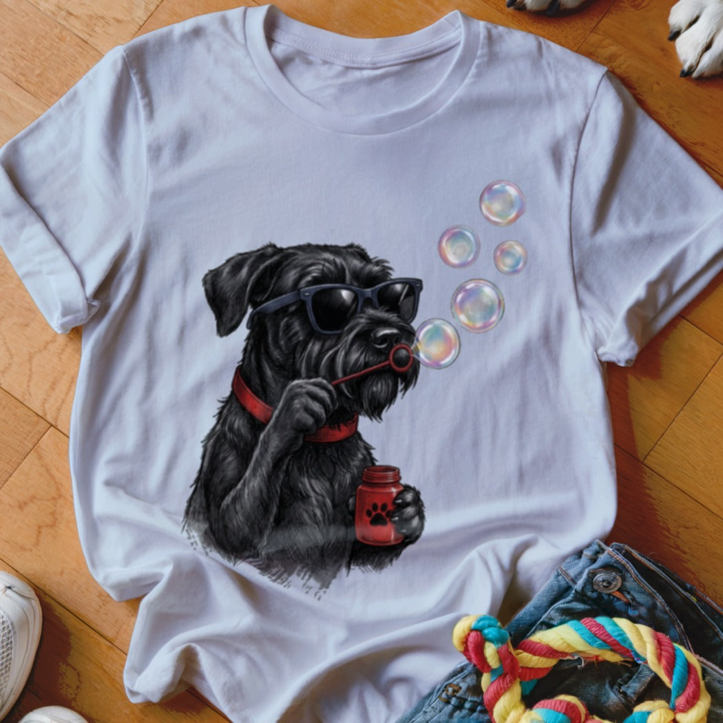A white t-shirt featuring a graphic of a black dog wearing sunglasses and blowing bubbles.