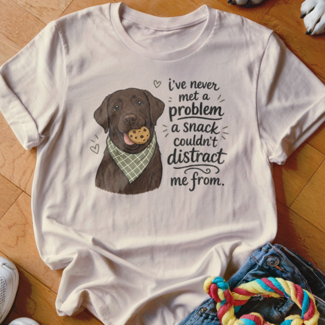 Chocolate lab wearing bandana with cookie, text says "I've never met a problem a snack couldn't distract me from."