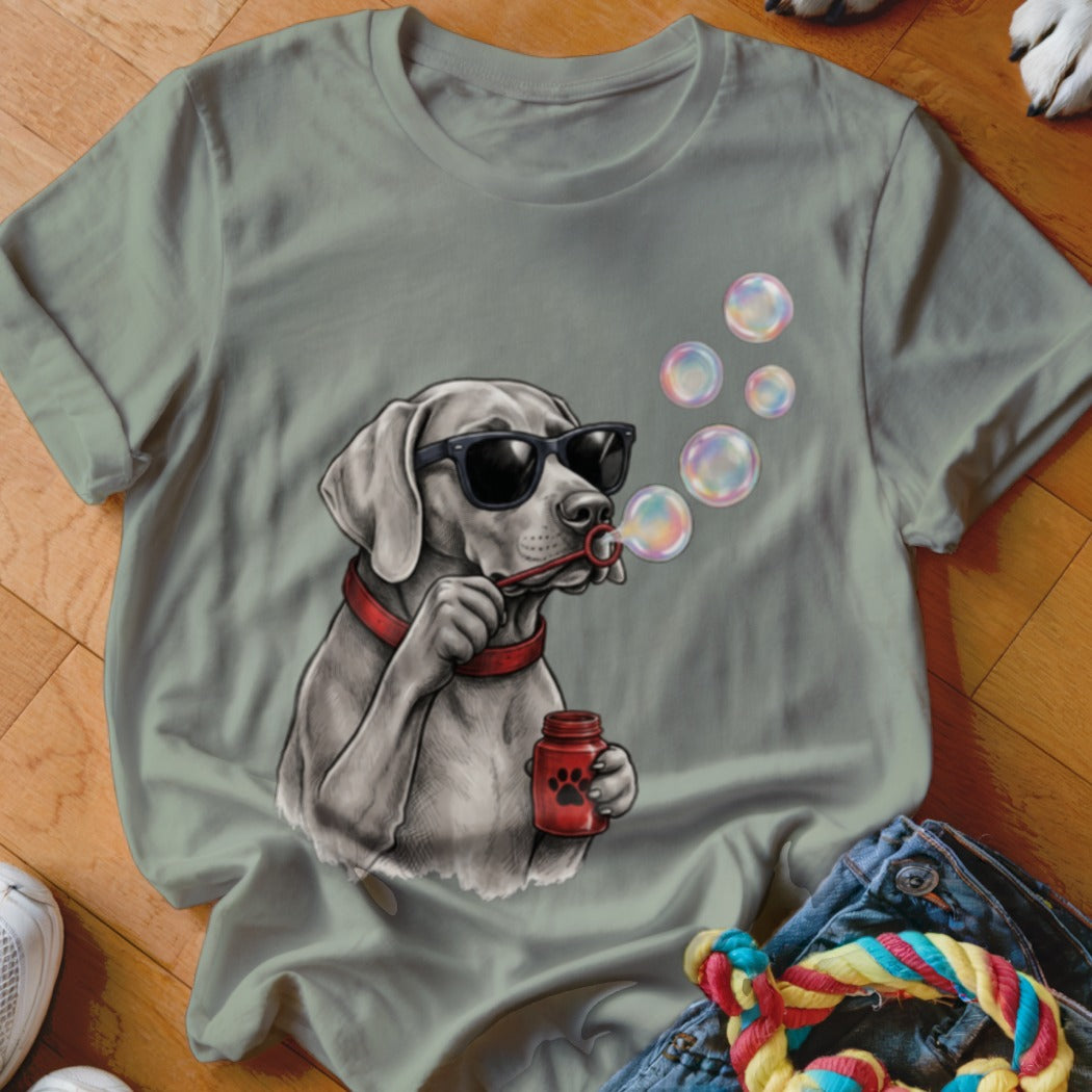 Gray crewneck t-shirt featuring a graphic of a dog wearing sunglasses and blowing bubbles.
