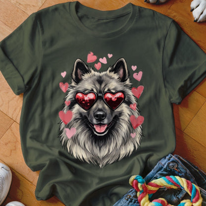 Dark green t-shirt featuring a fluffy dog wearing heart-shaped sunglasses surrounded by pink floating hearts.