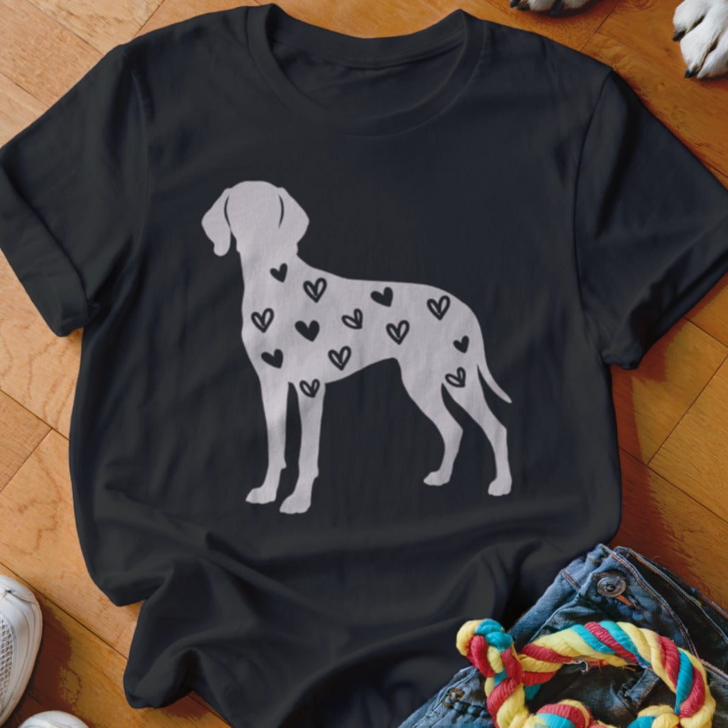 Black t-shirt with white silhouette dog covered in small black hearts.