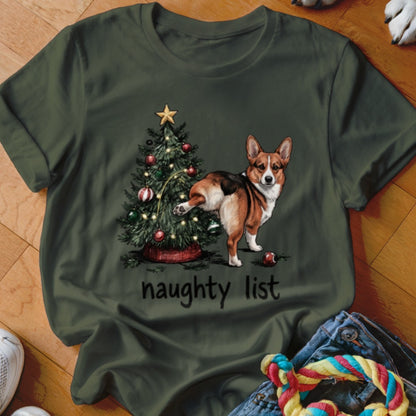 Corgi by Christmas tree with text "naughty list".