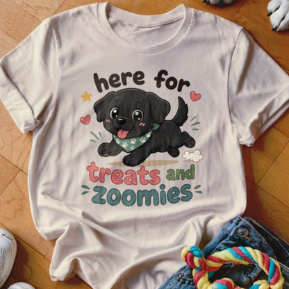 White t-shirt with a black puppy graphic that reads "here for treats and zoomies."